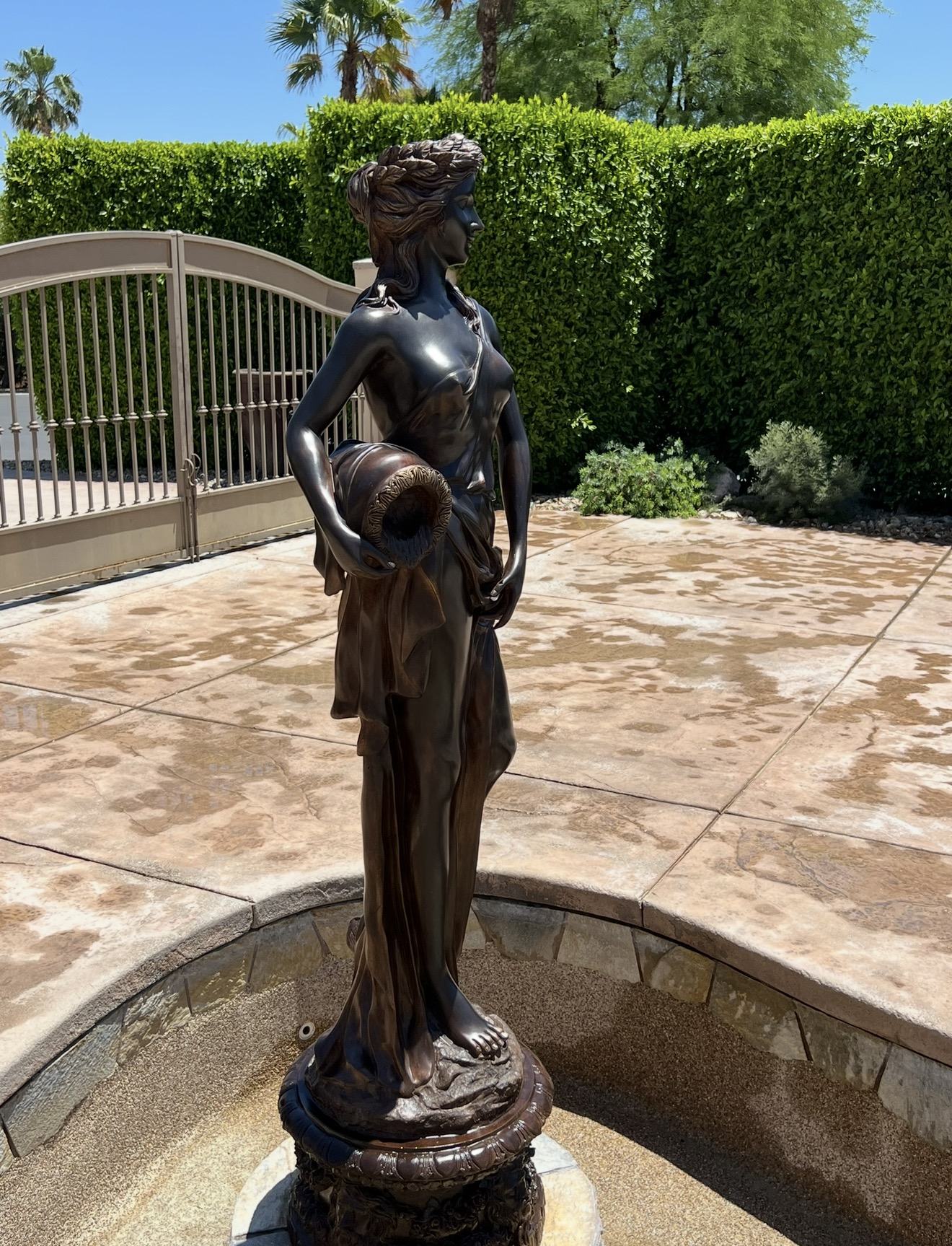 Bronze fountain sculpture restored to a rich brown patina in Rancho Mirage